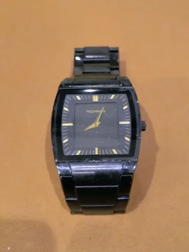 RELOGIO TECHNOS MASCULINO ORIGINAL EM AÇO , CÔR PRETA SLIM.
