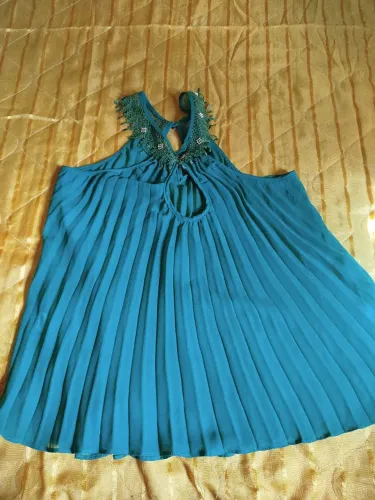 Blusa verde plissada