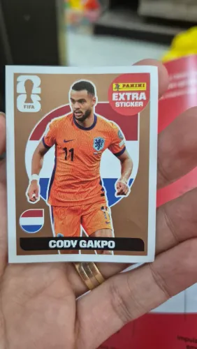 Figurinha extra sticker brinze, jogador CODY GAKPO, recem retirada do pacote, sem amassado
