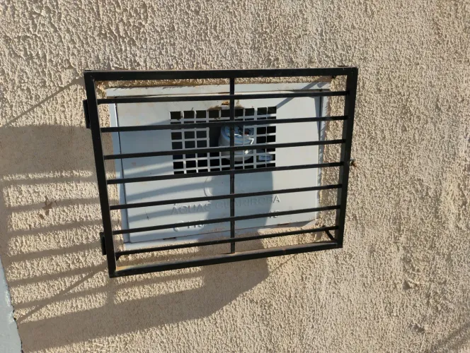 Grade de proteção para hidrômetro