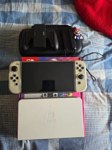 Nintendo Switch OLED Desbloqueado 64gb + 128gb