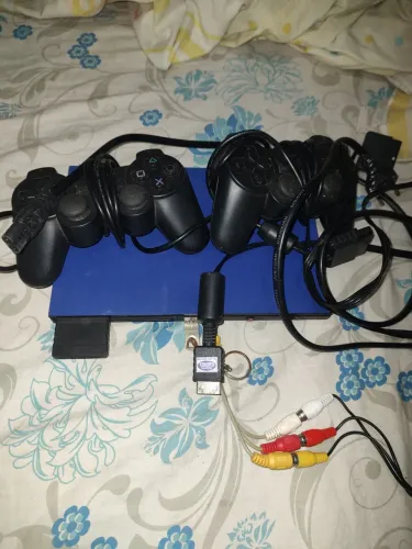 Vendo PS2 com vários jogos 