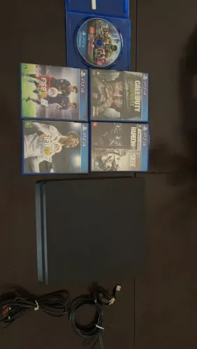 PlayStation 4 Slim com 5 jogos e 1 controle novo!