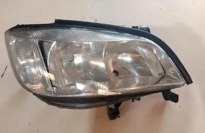 Farol Direito Zafira L.E 05/09
