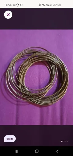 Pulseiras de metal dourado