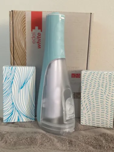 Escova de dentes elétrica com irrigador