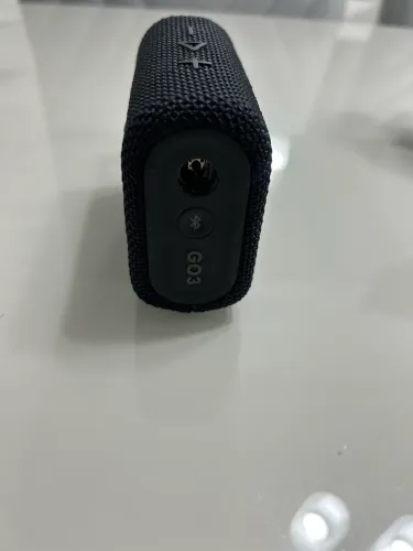Caixa de som JBL com defeito no fone 