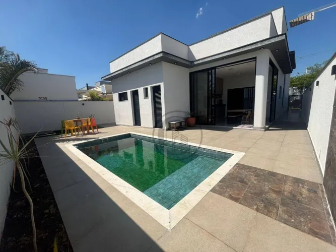 Casa à venda no Condomínio Villa Verona, 3 suítes, 5 vagas de garagem, piscina, escritório