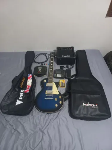 Guitarra + aparelhos e acessórios