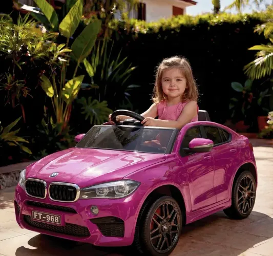 Carro elétrico infantil BMW rosa