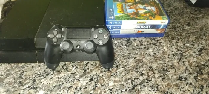 Playstation 4 FAT usado ,com 5 discos,w2k15,fita 18,lego Marvel super heroes,crash,detroid
