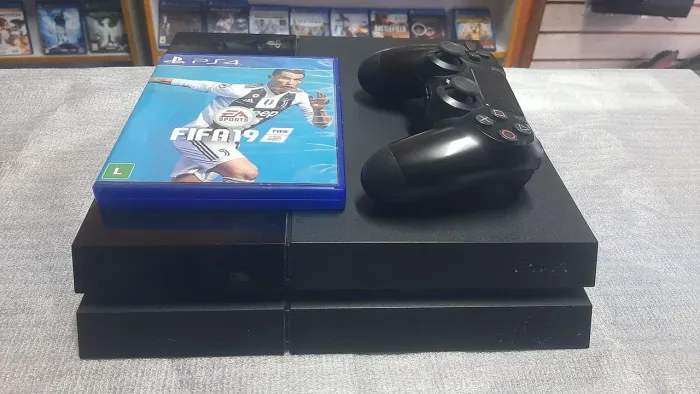 PS4 FAT + FIFA. ACEITO PS3 SLIM + VOLTA. GARANTIA.  LOJA 24 ANOS NO LOCAL.