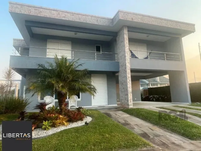 Casa de Condomínio em Atlântida Sul