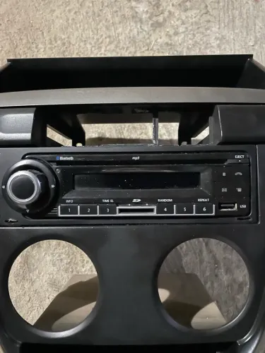 Moldura com rádio original Crossfox 2009