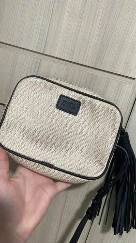 bolsa da schutz casaco da nike e boné 