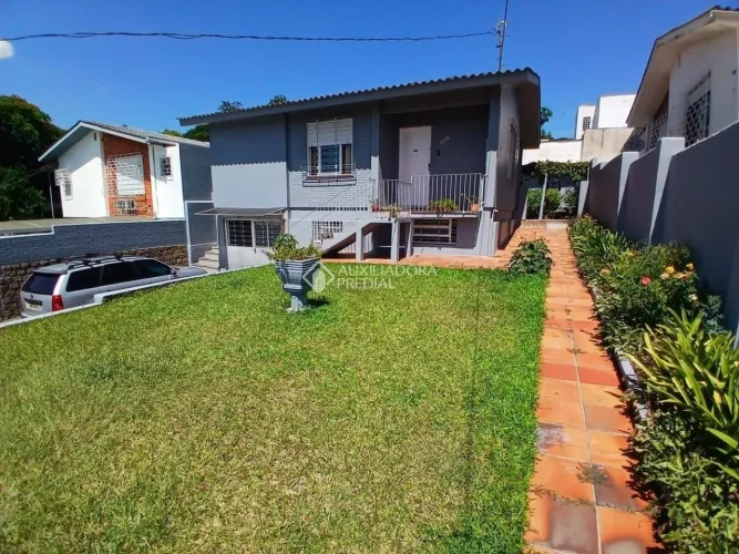 Casa de Condomínio 3 dormitórios no bairro Santa Tereza em Porto Alegre para Comprar