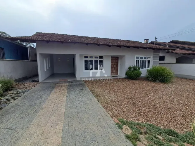 Casa residencial para alugar com 5 dormitórios no bairro Barra do Rio Cerro - 192 m².