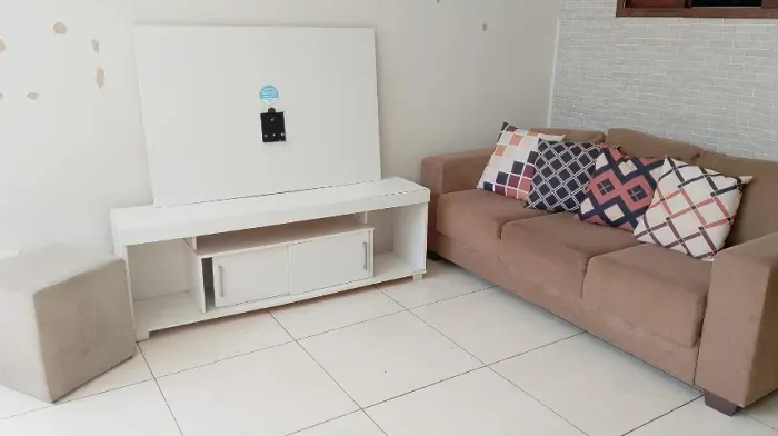 Sofa retratil com pufe de brinde 