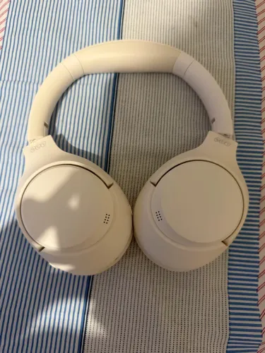 Headphone QCY H3 em estado de novo