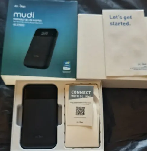 GL-INet MUDI <br><br>udi<br>PORTABLE 4G LTE ROUTER<br><br>for Security-savvy Road Warriors<br><br>GL-E750V2