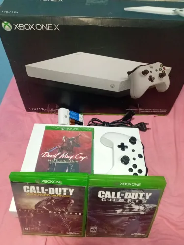 Vendo Xbox one x seminovo com jogos em mídia digital e física 