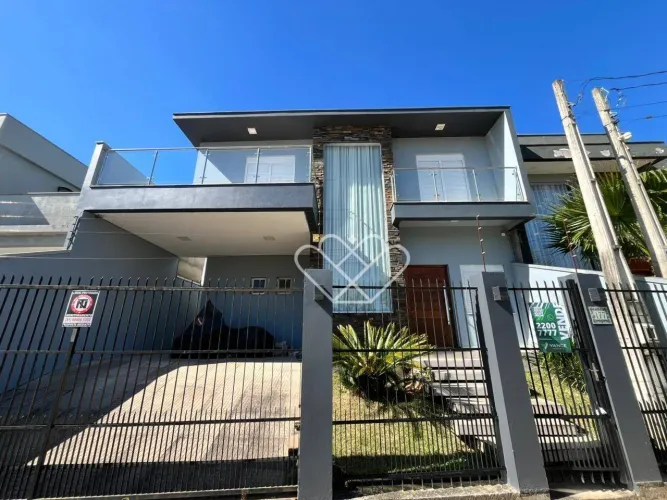 Casa com 3 quartos, suíte e piscina no bairro Bela Vista em Gravataí para venda e locação