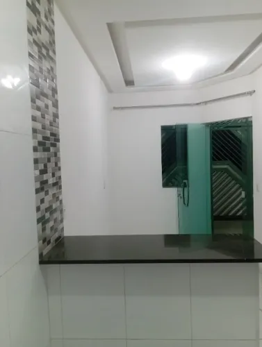 Alugo casa com garagem