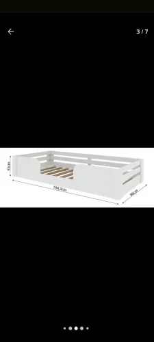 Cama infantil com grade de proteção 