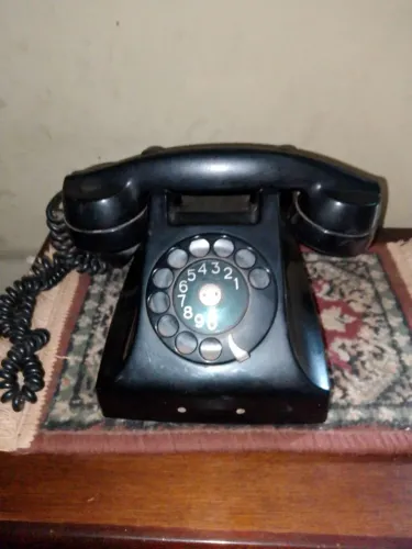 Telefone antigo de disco marca ericsson