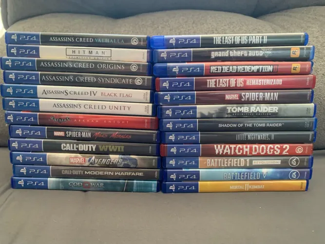 Lote 24 Jogos PS4 - Top Títulos (GTA V, Red Dead 2, TLOU, Spider-Man, God of War)