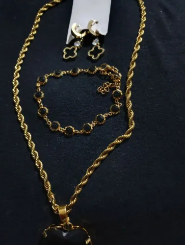 Conjunto de jóia em aço inox dourado