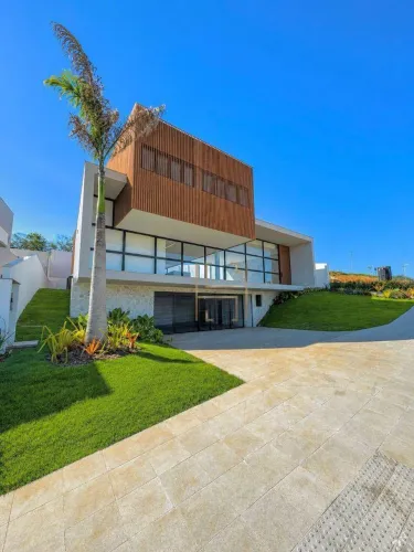 Casa com 6 dormitórios à venda, 500 m² por R$ 6.800.000,00 - Portal de Guarapari - Guarapa