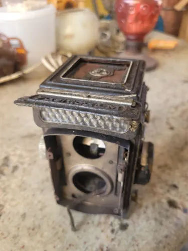 Parte de uma Máquina Fotográfica  Yashica LM.