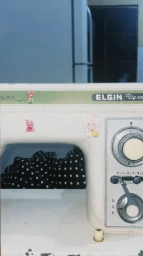 Máquina de costura elgin
