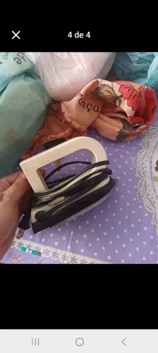 Mini ferro portátil funcionando perfeitamente