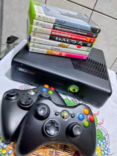 Xbox 360 slim impecável novo com 02 controles originais novos + 07 jogos originais 