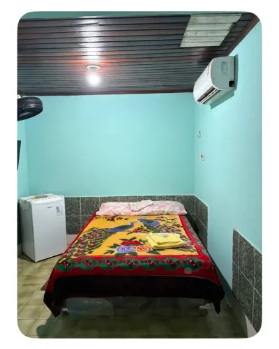 Quarto em casa de família