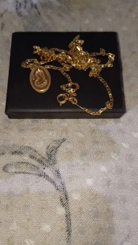 Corrente de ouro,18 750. Não vendo pela grama 