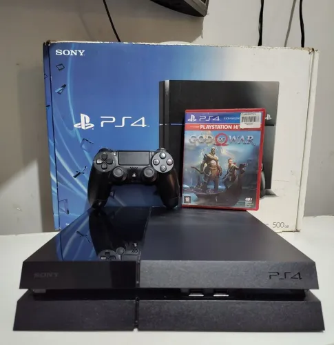 PS4 500 GB seminvo completo GARANTIA jogo de brinde.