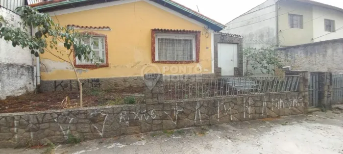 Terreno à venda no bairro Vila Brasilina com uma casa térrea e 3 vagas