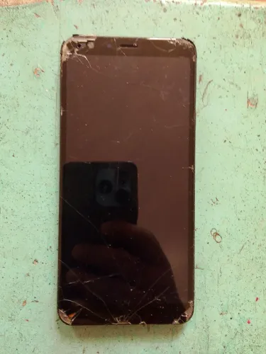 Celular ASUS para retirada de peças. R$25,00