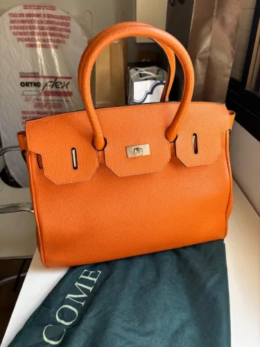 Bolsa argentina em couro verdadeiro forrada com ziper interno - perfeito estado