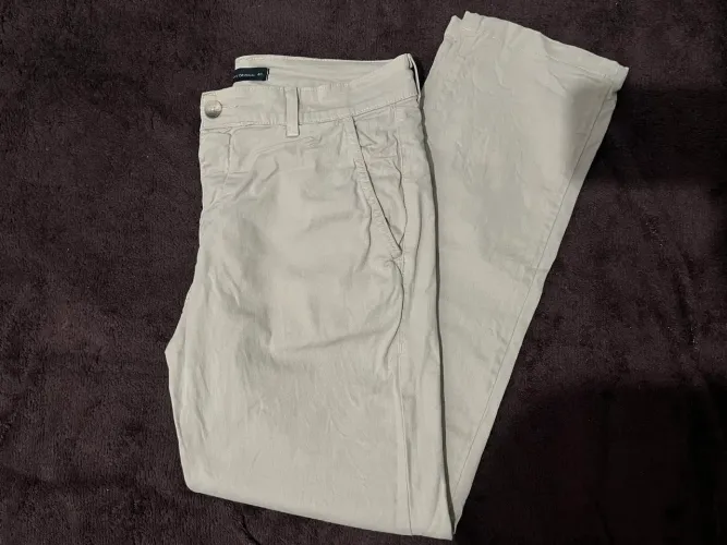 Calça slim bege masculina