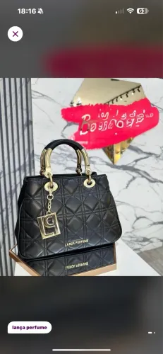 Bolsa lança perfume NOVA COM ETIQUETA 