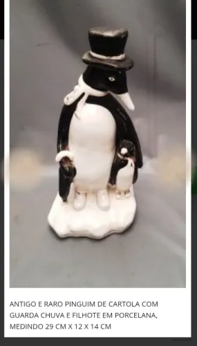 Pinguim com filhote e guarda chuva. Anos 1960