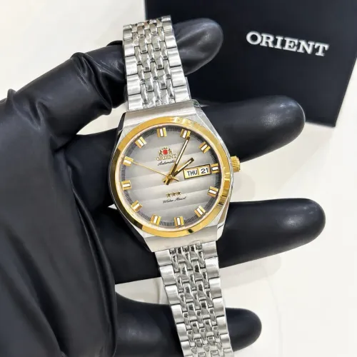 Relógio Orient 3 estrelas misto prata Bezel dourado novo