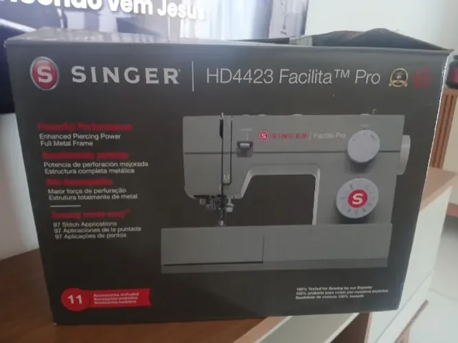 vendo uma máquina de costura singer