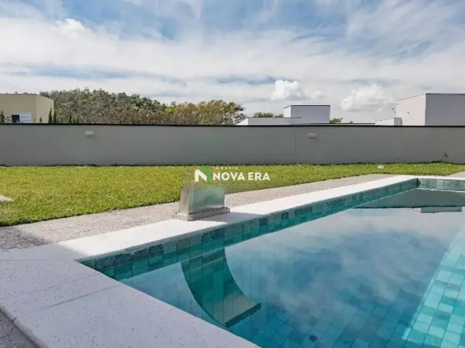 Casa com 3 dormitórios à venda, 303 m² por R$ 2.650.000,00 - Condomínio Reserva dos Vinhed