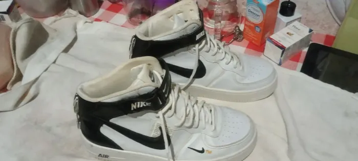 Tênis Nike Air Force 1 Mid Utility White Black.<br> <br>Faça uma pergunta complementar