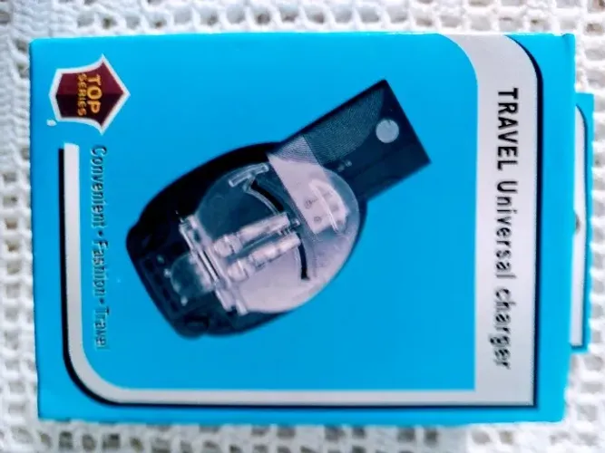 Vendo carregador universal Travel novo na caixa 
